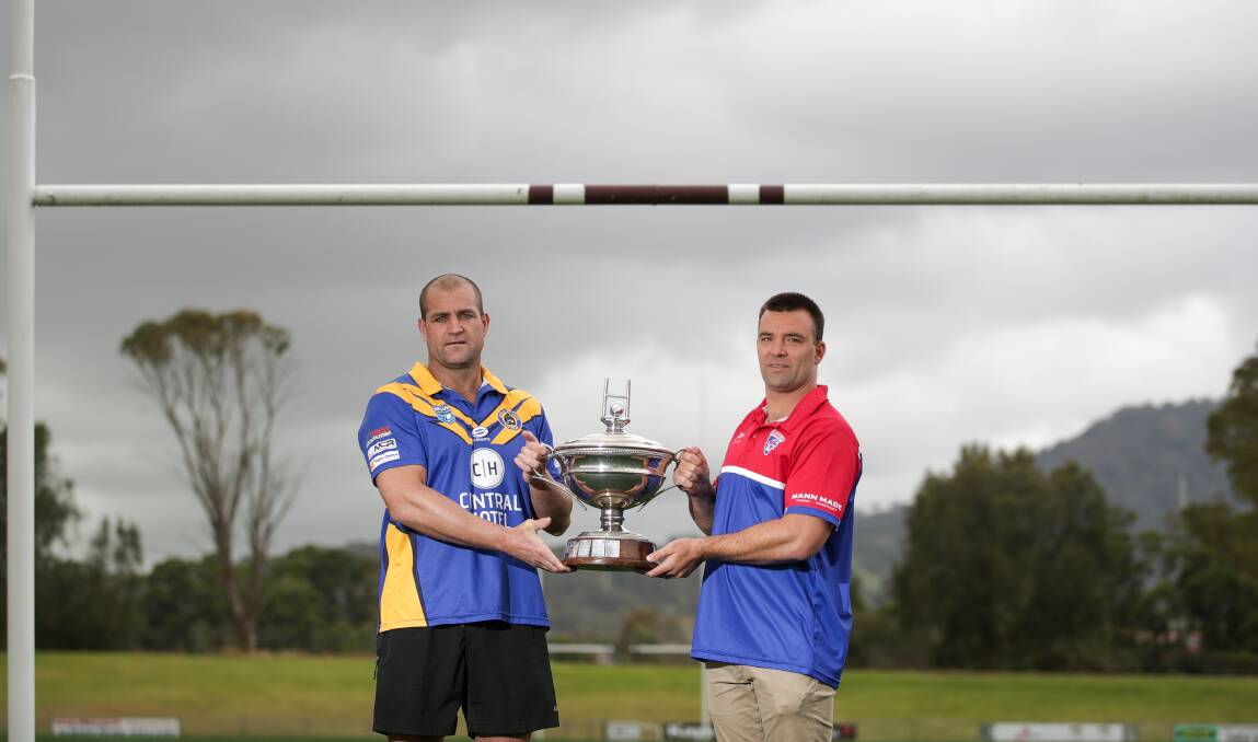Warilla's Aaron Henry and Gerringong's Nathan Ford holding the Artie Smith Trophy ahead of Sunday's grand final. Picture by Adam McLean