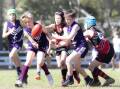 The U11 Ulladulla Dockers and Bay & Basin Bombers clashing in the finals. Picture by Team Shot Studios.