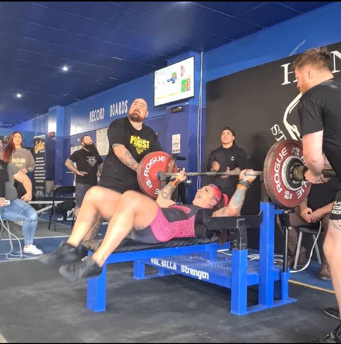 ALL SMILES: Jaymi Morris smiling after setting the new bench press national record of 140kg. Picture: Supplied.