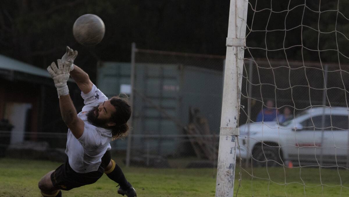 EYES ON THE PRIZE: Culburra's Thomas Matthews putting his body on the line against Huskisson. Picture: TEAM SHOT STUDIOS 