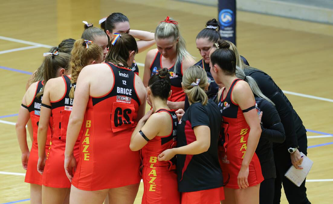 LOOK TO BOUNCE BACK: The Opens South Coast Blaze huddling mid-match in last night's action against the Panthers. Picture: May Bailey/Clusterpix Photography