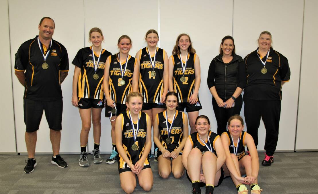 GOING FOR GOLD: The U16 Girls with their gold medals post their victory over Illawarra. Picture: Amanda Volpatti. 