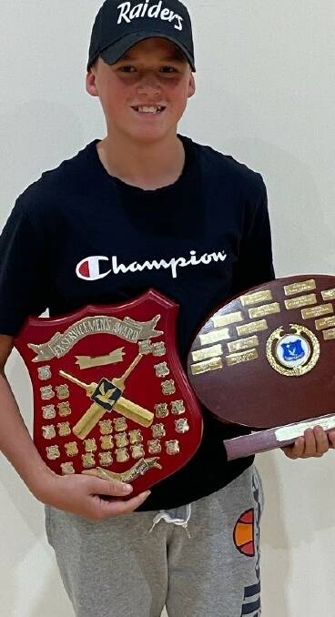 Local cricketer Chayce Brown with his awards from last season. Supplied picture 