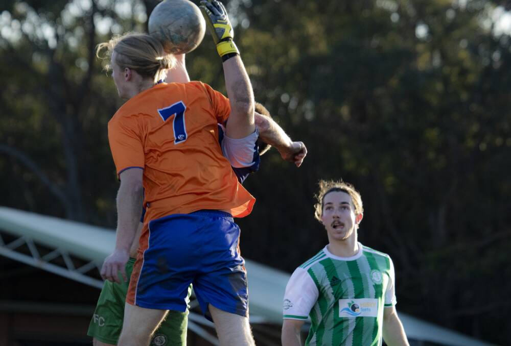 VERTICAL LEAP: Culburra's Doug Gray flying high for the header. Picture: TEAM SHOT STUDIOS