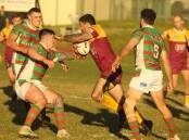 Shellharbour Sharks second-rower James Ralphs tries to get between three Jamberoo defenders during Saturday's thriller at Kevin Walsh Oval. Picture: Kiara Foye 