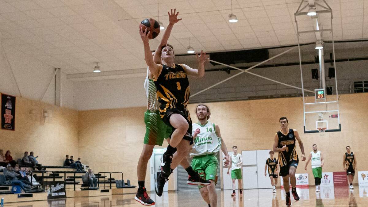 STARTING WITH A BANG: The Tigers Youth Men dominate in their opening win. Photo: Amanda Volpatti