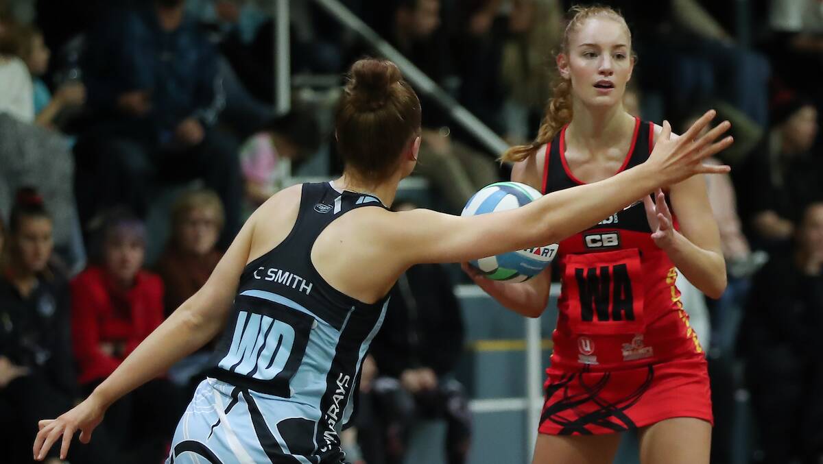 CHALK IT UP: WA Maddy Eaton surveying the court against the Stingrays. Picture: Clusterpix Photography 