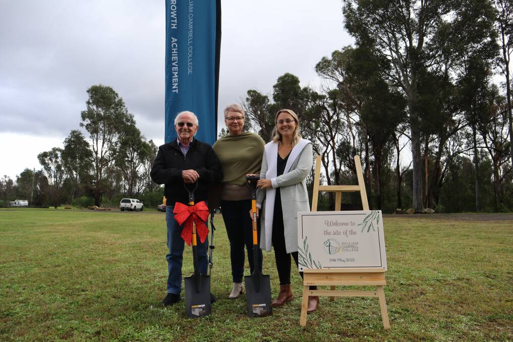 GROUNDBREAKING: Bill Campbell, Sonia Liddicoat (CEO, William Campbell Foundation), and policy and curriculum developer Amanda Cox break ground on the future William Campbell College in Nowra Hill. Photo: Jorja McDonnell.