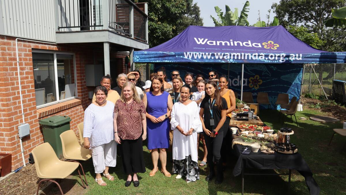 Gilmore MP Fiona Phillips and Shadow Minister for Indigenous Australians, Linda Burney (centre), with Waminda board members, staff, and mothers. The MPs have promised $22 million to Waminda's Birthing on Country Centre for Excellence, should Labor win the upcoming election.