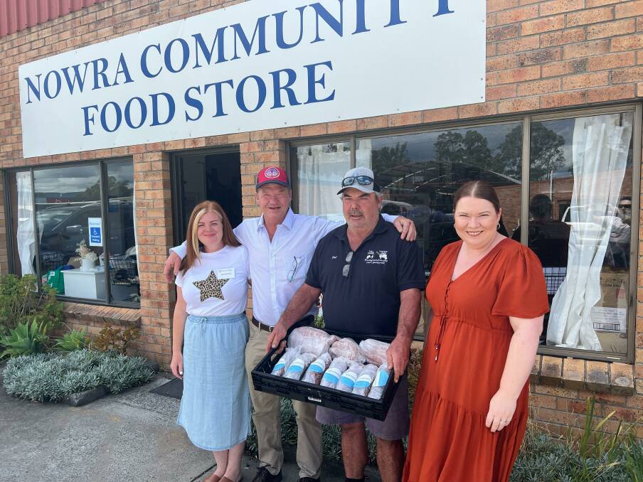 Paul Timbs and Simon of South Coast Food Group (centre) with Nowra Community Food Store's Amanda Phillis and Jemma Tribe. Picture supplied.