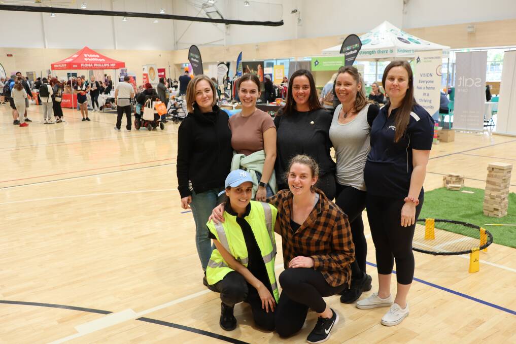 WORKING, THRIVING: Marsha Makary (front left) and Shoalhaven City Council's community capacity building team organised the Thrive Together Fair to support locals in need. Picture: Jorja McDonnell