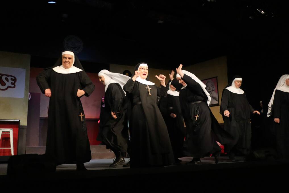 Robby Lassman as Reverend Mother Regina (centre) and Michelle Greber as Sister Hubert (left) in Nunsense. Picture by Jorja McDonnell.