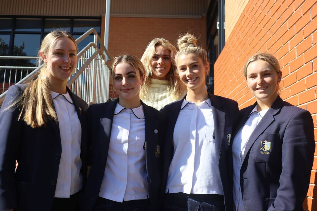 TOP TALENTS: St John's HSC Dance students Lily Webster, Allyx Cornelius, Madeleine Allen and Molly O'Neill, with their teacher Savannah Lloyd. Picture: Jorja McDonnell