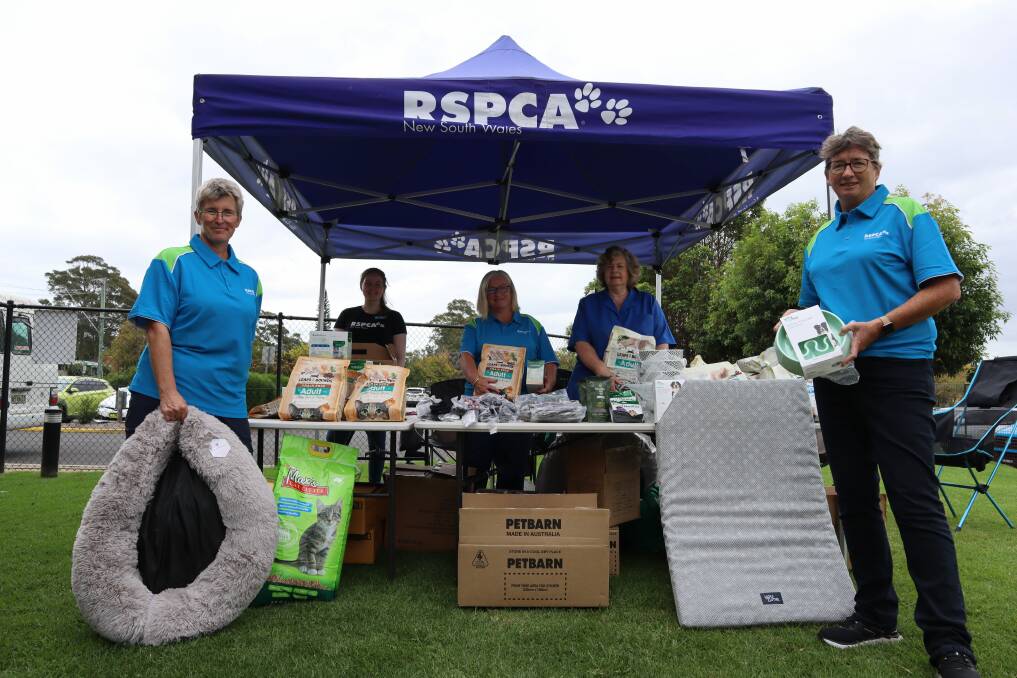 HELPING PAW: The RSPCA NSW Community Flood Relief Point at The Country Club, Sanctuary Point. Claire Pitham (volunteer, Eurobodalla), Rosemary Pitty, Annette Wilson (supervisor, Illawarra), Judith Wright (vice president, Illawarra), and Ruth Mackay (volunteer, Eurobodalla).