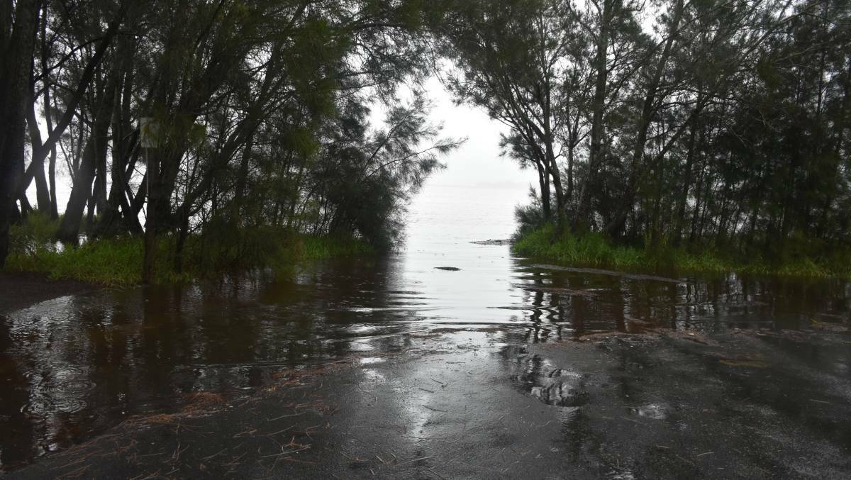 ACT NOW: The SES is asking residents in low-lying areas of Sussex Inlet to prepare for moderate flooding. Picture: Danielle and Matt Connolly Photography.
