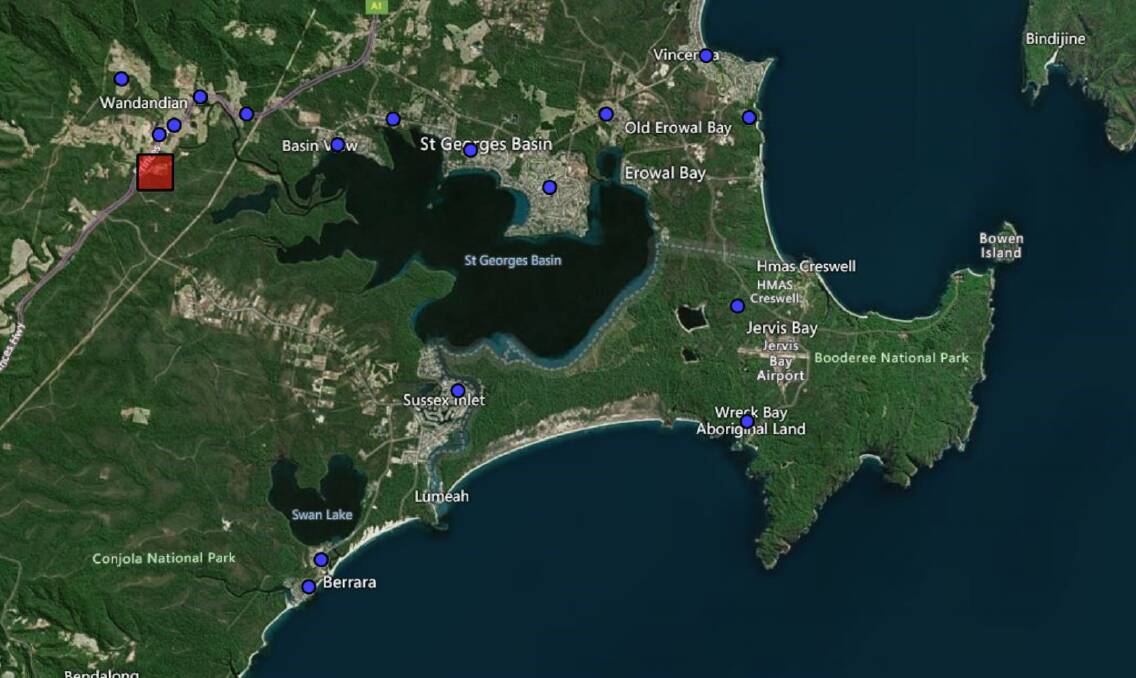Map of known mobile black spots in the Jervis Bay Territory and surrounds. The blue points are reported black spots, and the red square (left) is a funded base station under the Mobile Black Spot Program. Picture: Australian Government National Map.