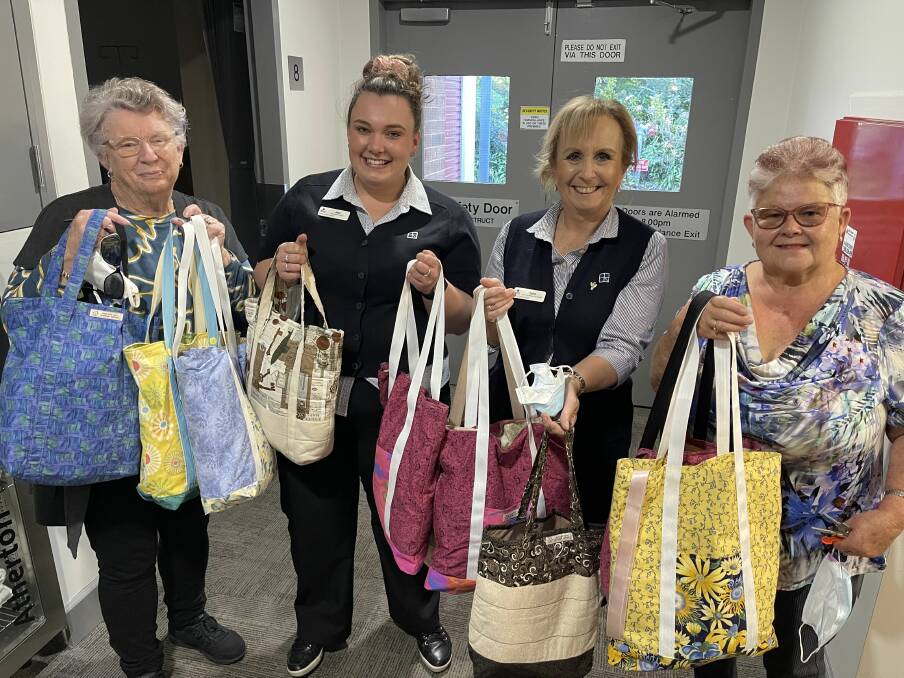 CRAFTING COMFORT: Quilters from the Birdhouse Group have donated care packages to Nowra Private Hospital, in a bid to help cancer patients go through treatment comfortably. Picture: supplied.