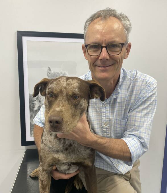 Dr Neal Johnson and dog James. Picture: Supplied. 