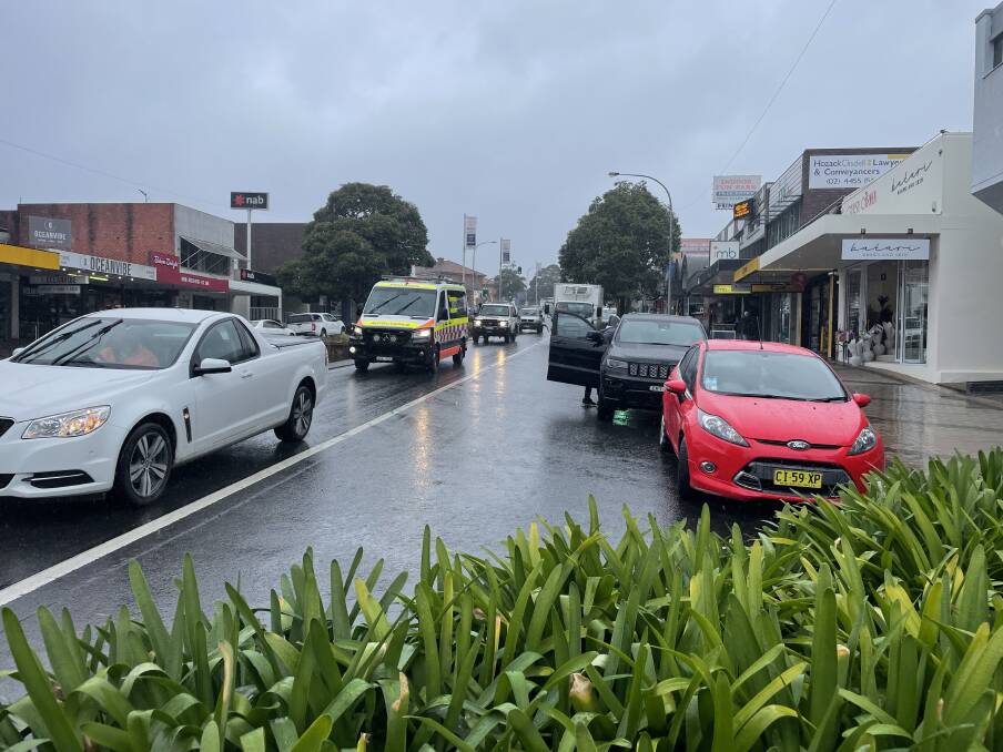 Highway through Ulladulla, busy on a rainy Friday afternoon. Picture: Tom McGann.