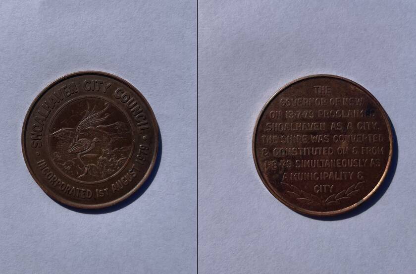 The front and back of the coin. Picture Tom McGann.