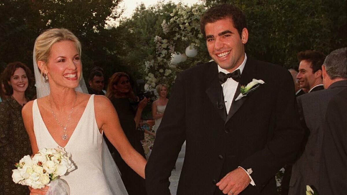 Bridgette Wilson and Pete Sampras at their wedding on September 30, 2000 at an intimate ceremony in Los Angeles. Picture via AP Photo/BEI