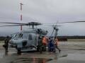 A Seahawk MH-60R Romeo helicopter is prepared for flight at HMAS Albatross. File photo.
