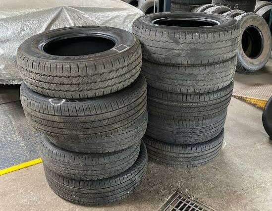 Piles of damaged tyres at Nowra's Better Tyres. Picture by Glenn Ellard.