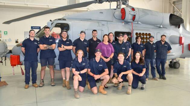 Federal Member for Gilmore, Fiona Phillips, meets with Sikorsky Australias newest intake of apprentices while touring Sikorskys maintenance and logistics support facilities in Nowra. Picture by Sikorsky Australia.