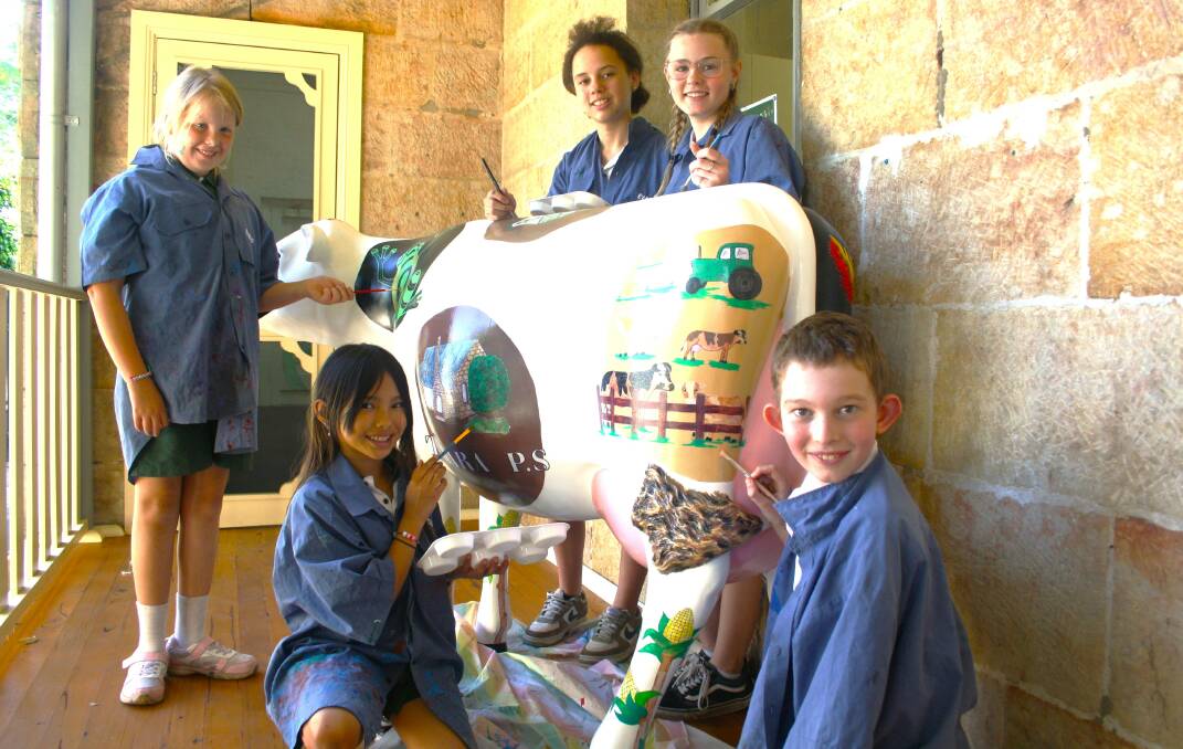 Adding the final touches to Millie the cow at Terara Public School are students Ruby Cladingbowl, Fynn Peerless, Elise Grimes, Ally Hinsley and Hayden Cochrane. Picture by Glenn Ellard.