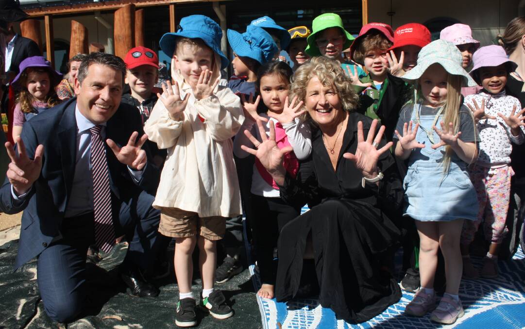 Health Minister Ryan Park and State Member for South Coast, Liza Butler, are joined by some of the Shoalhaven Community Preschool children during the official opening. Picture by Glenn Ellard.