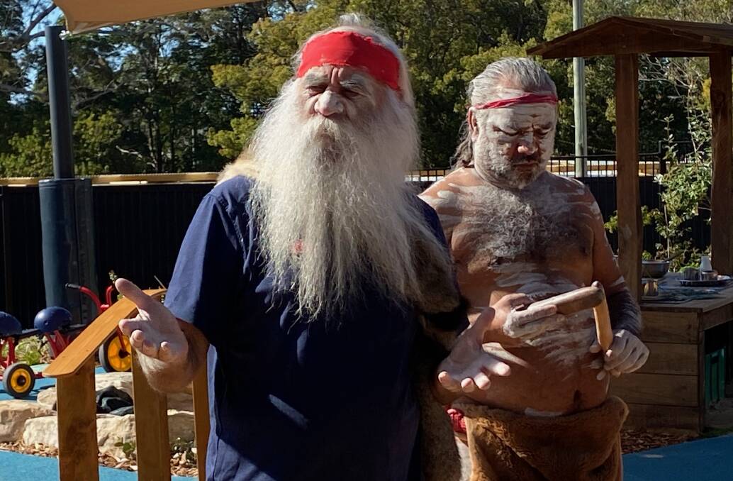 Uncle Paul McLeod and Joe Brown-McLeod perform a welcome to country during the new Shoalhaven Community Preschool's official opening. Picture by Glenn Ellard.