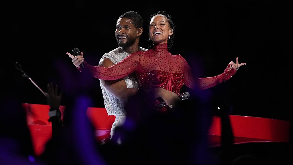 Usher and Alicia Keys perform during halftime of the NFL Super Bowl in Las Vegas. Picture by AP Photo/Brynn Anderson