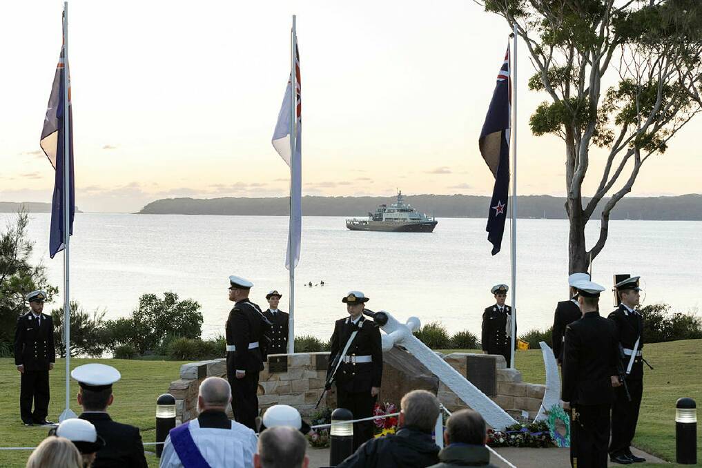 Royal Australian Navy training vessel MV Sycamore at anchor off HMAS Creswell during the Anzac Day dawn service. Picture Commonwealth copyright and supplied by Department of Defence