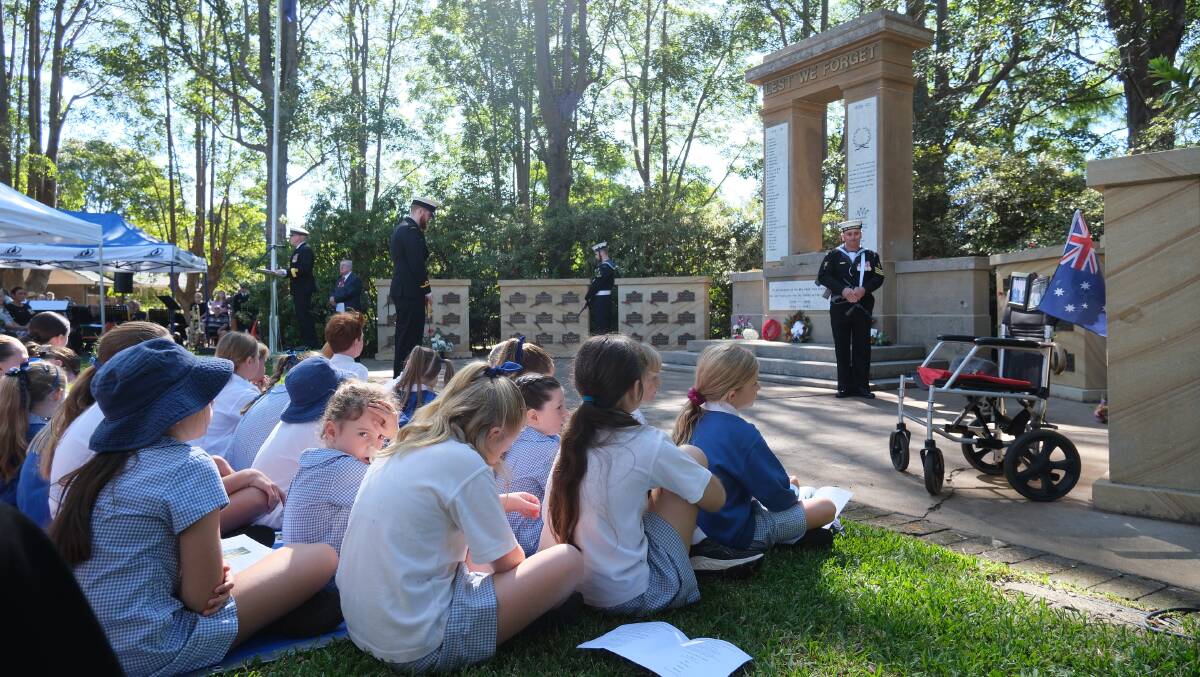 Students watch on at War Memorial Gardens as the ANZAC Day service took place. Picture by Holly McGuinness