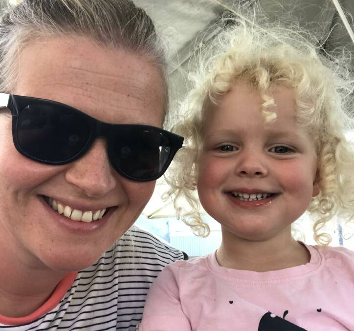 DESPERATE TO RETURN: Bonnie Court and her daughter Josephine are desperate to get to Tasmania, where Ms Court already has a job and home ready for the young family. Picture: Supplied