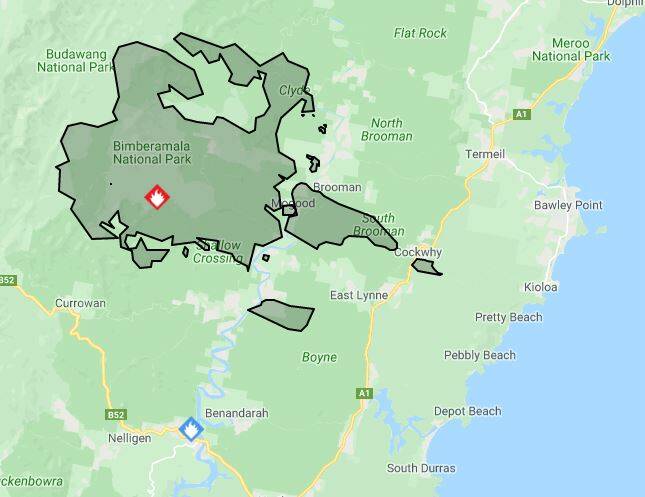 The Cockwhy Creek area west of East Lynne is surrounded by fire, but has so far escaped direct threat. However residents such as Kim Hammond know they are vulnerable to wind changes from any direction.