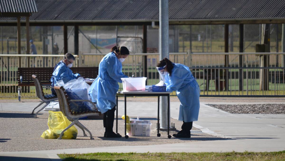 A testing station at Hanging Rock, Batemans Bay, during winter after a COVID-19 outbreak. Tests on the sewage system in the area on November 17 revealed fragments of the virus which causes the disease.