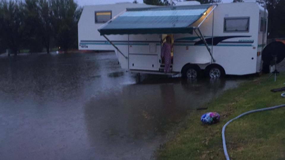 A flooded Moruya Showground, across the road from Moruya High School  where George Bass competitors were camping on Sunday night. Low-lying parts of Moruya have been inundated in the downpour.