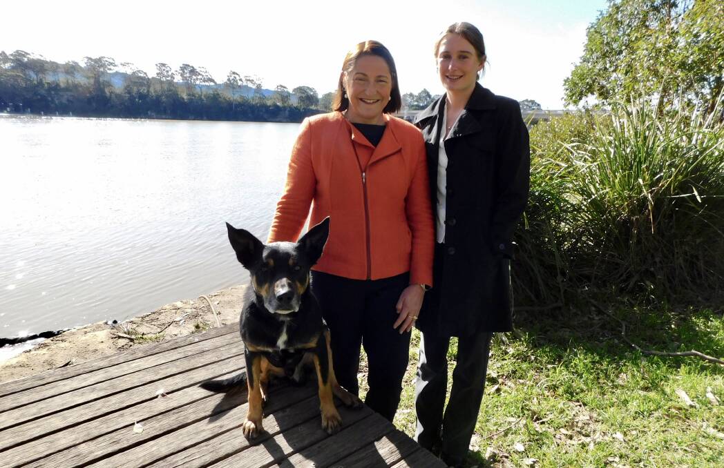 Fiona and Sophie Phillips with Jip the Kelpie.
