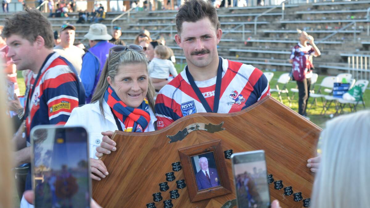 Bega Roosters first grade captain-coach Cameron Vazzoler celebrates with team-mates and fans following the 2022 grand final victory. Picture by Ben Smyth