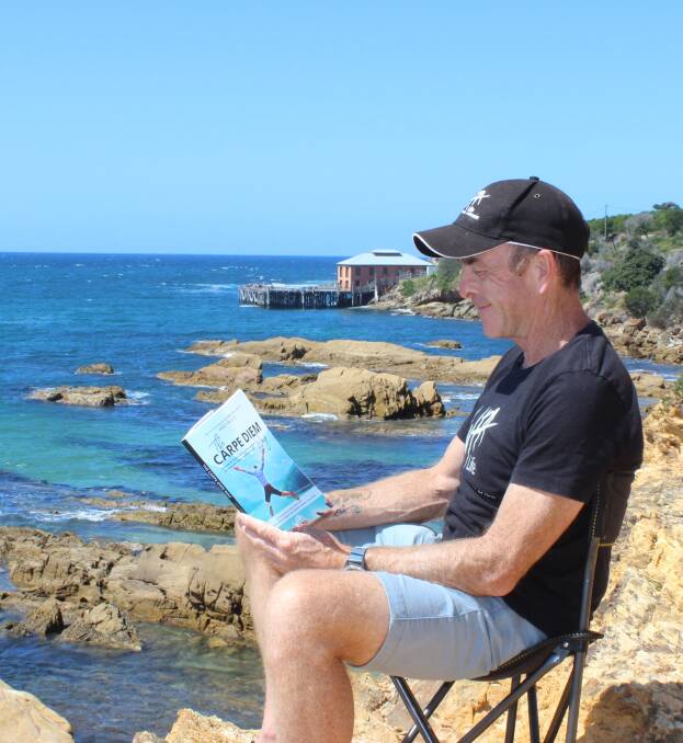 While calling Tathra home, Andy Willis is a man with a message of freeing yourself from a work "place".