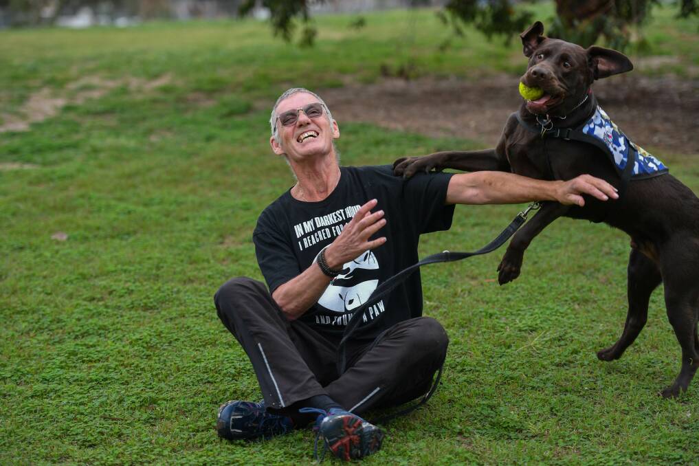 'All I have is my dog': Ron Fenton with Yogi. Photo: Joe Armao