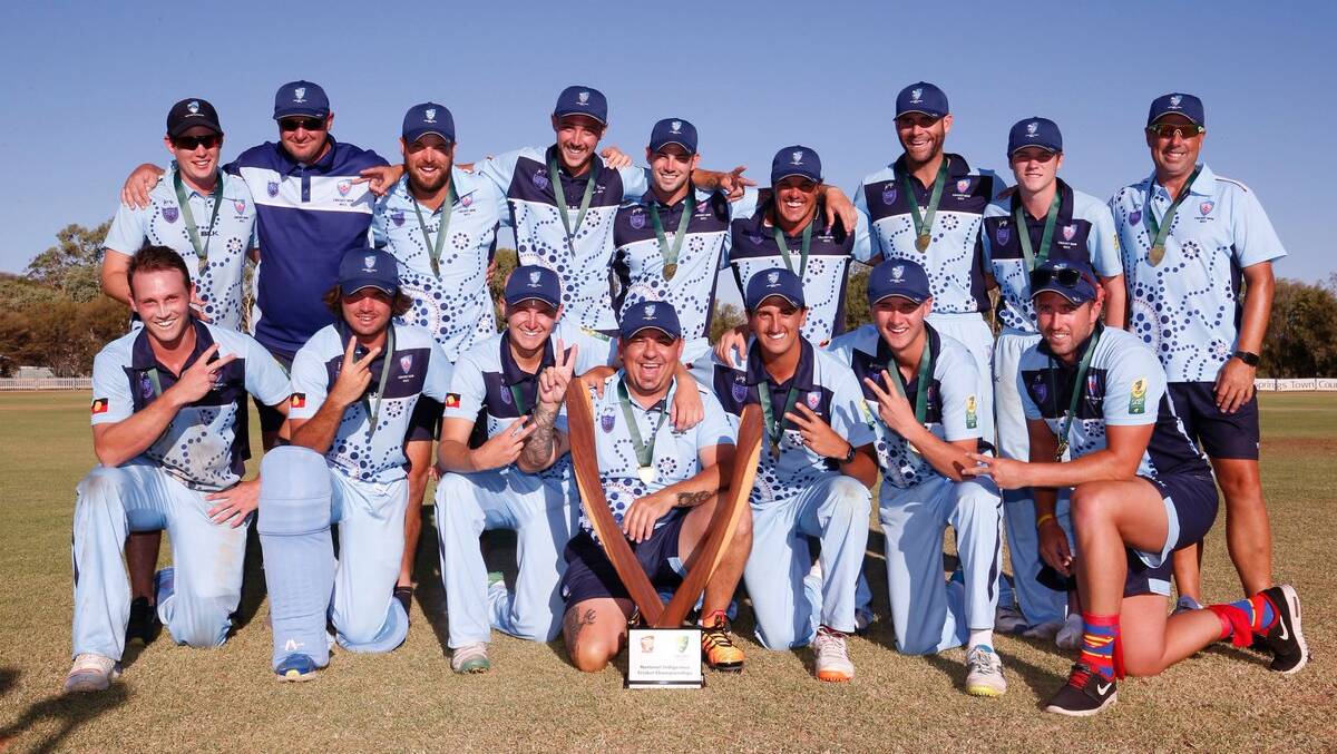 Nate Jones (back row, fourth from left) and his NSW Indigenous side after winning the Imparja Cup. Photo: CRICKET AUSTRALIA