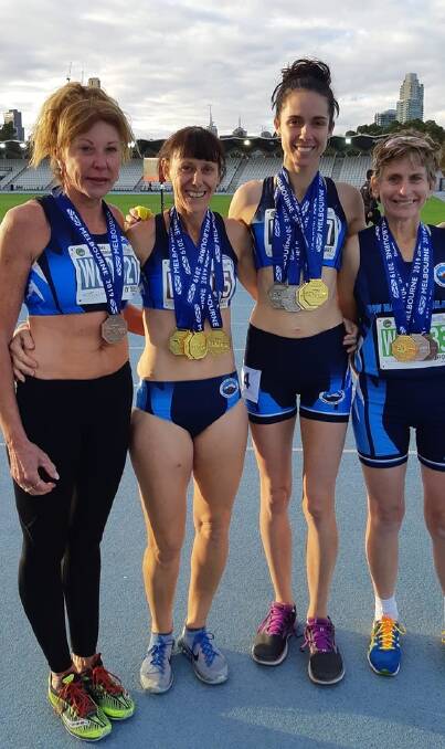 Shoalhaven athletes Erin Smart (second from right) and Cristine Suffolk (far right) with other NSW medal winners in Melbourne. Photo: Valmai Loomes