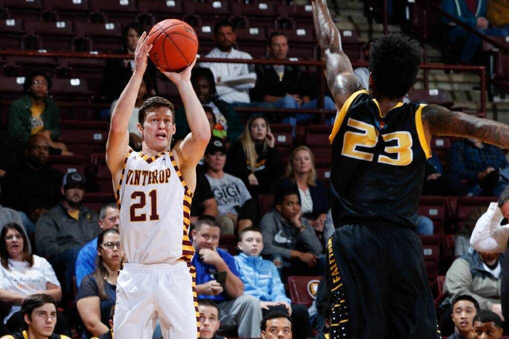 Sanctuary Point product Kyle Zunic sets himself for a jump shot for Winthrop. Photo: EAGLES MEDIA