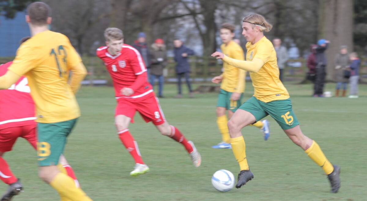 GOLDEN BOY: Vincentia's Jake Trew goes on the attack against England while representing the Australian Schoolboys team in the UK.