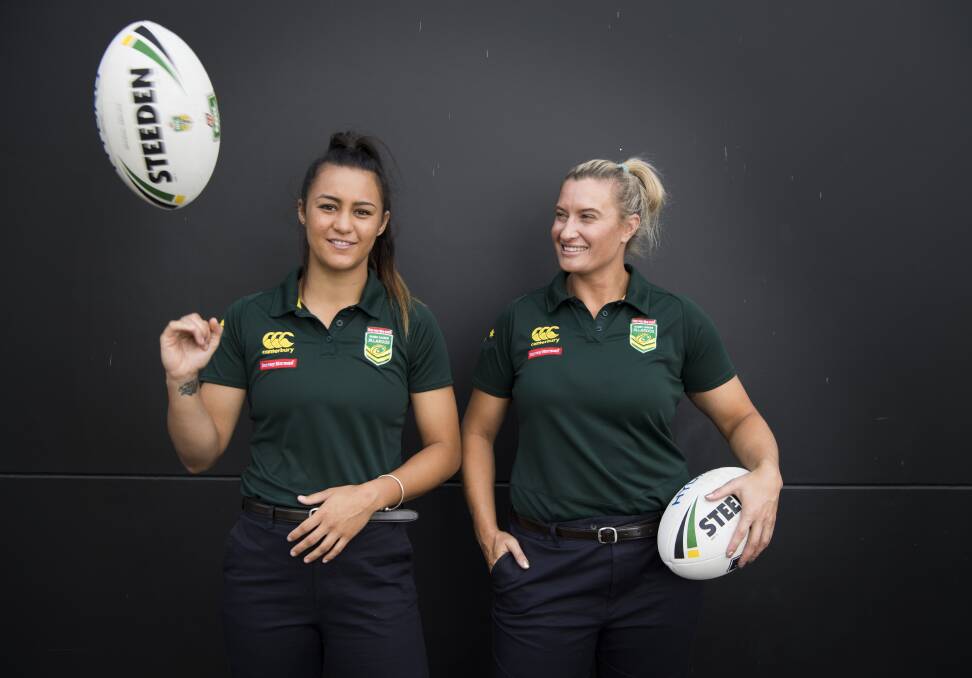 Jillaroos players, Corban McGregor and Ruan Sims , after the media announcement regarding the future of women's rugby league and the 2018 womens rugby league calendar. Photo: Louise Kennerley