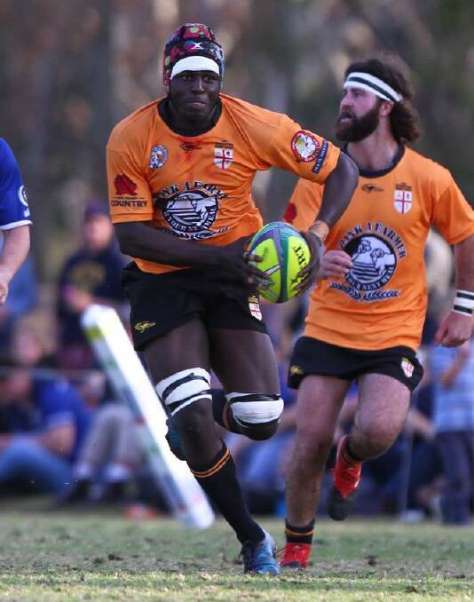 Takunda Chimwaza makes a run for the Cockatoos. Photo: Josh Brightman | Balanced Image Studio