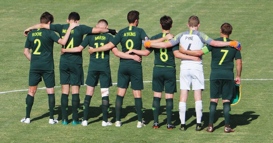 Ben Atkins (fourth from left) and his Pararoos team mates. Photo: FFA