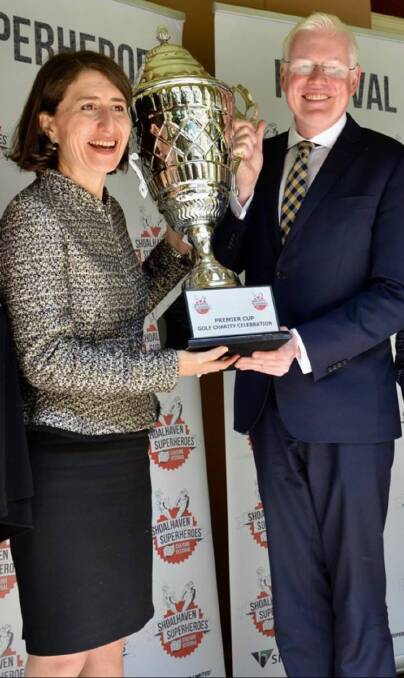 NSW premier Gladys Berejiklian and Kiama MP Gareth Ward with the cup.
